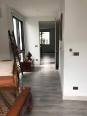 A well-lit hallway with modern decor