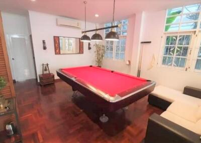 Recreation room with pool table and lounge area