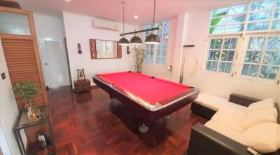 Recreation room with pool table and lounge area