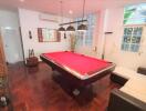 Recreation room with pool table and lounge area