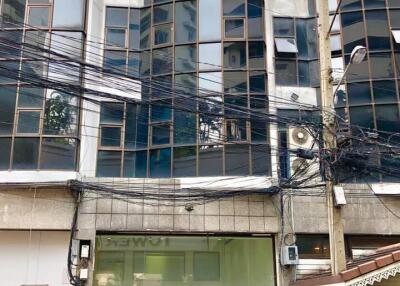 Front view of a commercial building with glass facade