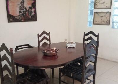 Dining room with a wooden table and chairs