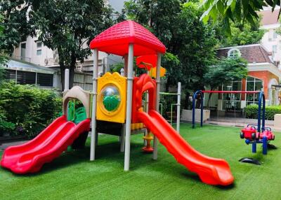 Outdoor playground with slides and swings