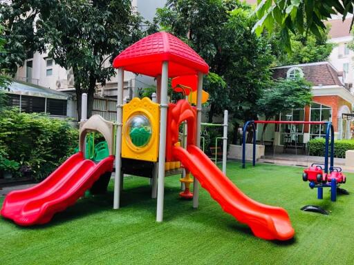 Outdoor playground with slides and swings