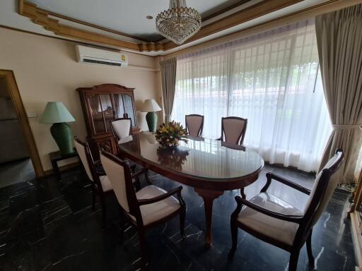 Elegant dining room with large windows