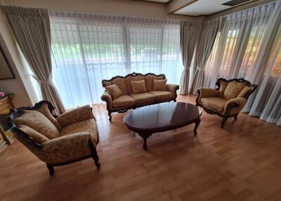 Living room with vintage sofas and coffee table