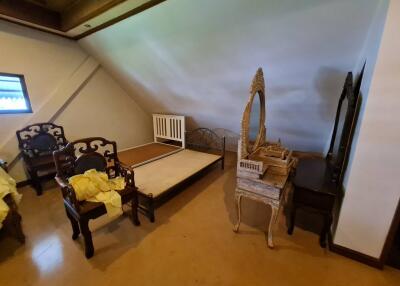 Attic bedroom with furniture