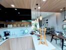 Modern kitchen with dining area in an open-concept living space