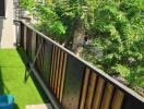 Balcony with artificial grass and city view