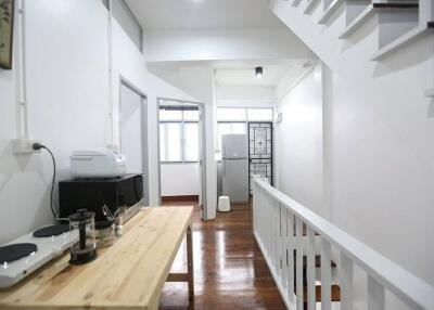 Modern kitchen with wooden countertop and appliances