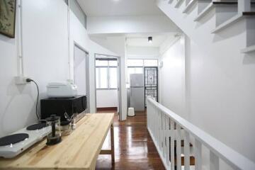 Modern kitchen with wooden countertop and appliances