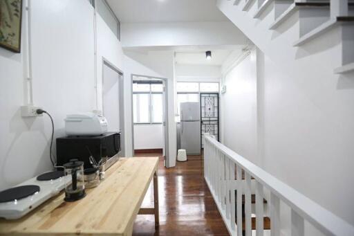 Modern kitchen with wooden countertop and appliances