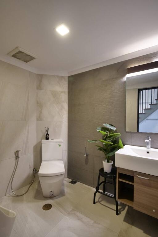 Modern bathroom with toilet and sink