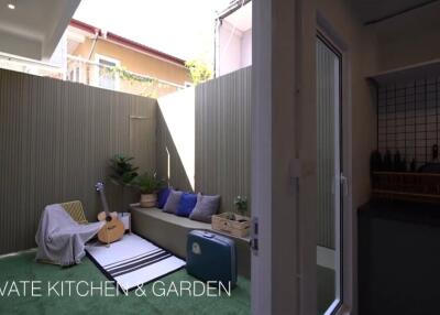 Private Kitchen and Garden with seating area and decorative elements