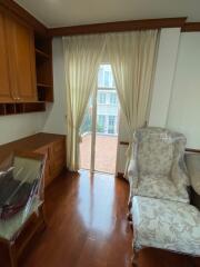 Cozy living room with balcony access