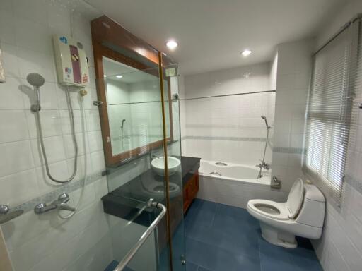 Bathroom with shower, bathtub, sink, and toilet