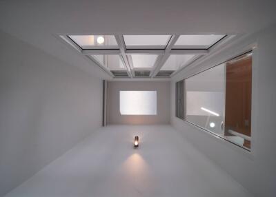 Modern interior with large skylight and minimalistic design