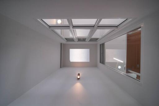 Modern interior with large skylight and minimalistic design