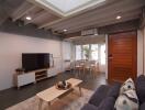 Modern living room with high ceiling and large windows