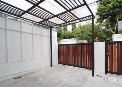 Covered outdoor space with gated entrance