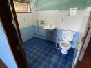 Clean blue and white tiled bathroom