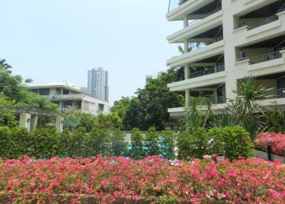 View of modern buildings with balconies and garden area