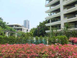 View of modern buildings with balconies and garden area