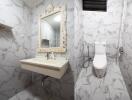 Modern bathroom with white marble tiles