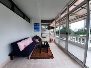 Spacious balcony with seating area