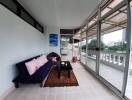 Spacious balcony with seating area