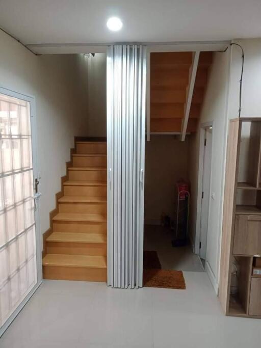 Hallway with stairs and partition