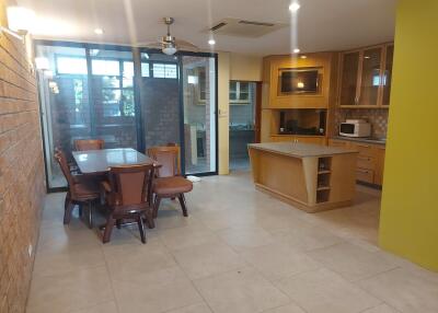 Spacious kitchen and dining area with modern amenities