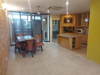 Spacious kitchen and dining area with modern amenities