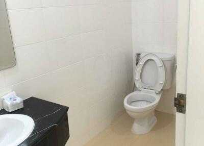 Modern bathroom with a white toilet and sink