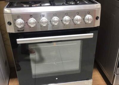 Modern freestanding stove with oven in a kitchen