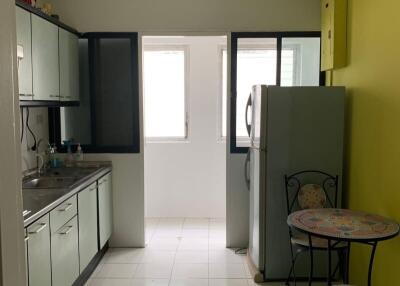 Modern kitchen with stainless steel appliances