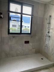 Spacious bathroom with a large shower area