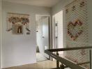 Hallway with decorative wall hangings