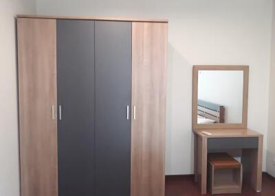 Bedroom with wardrobe and vanity table