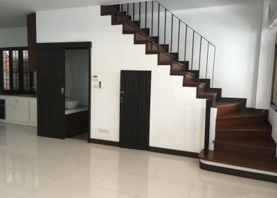 Staircase and entrance to a room