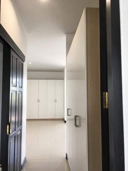 Bright hallway with storage cabinets