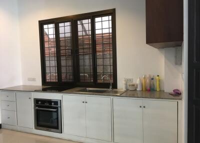 Modern kitchen with appliances and ample counter space