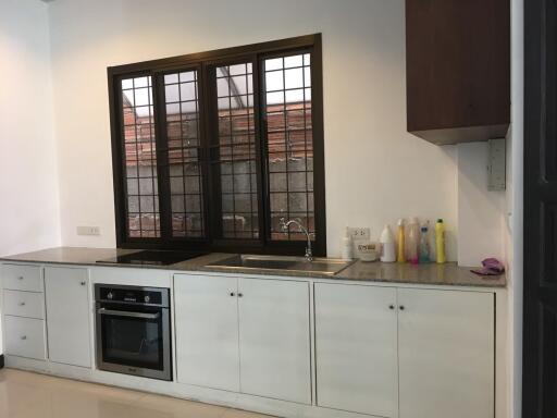 Modern kitchen with appliances and ample counter space