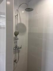 Modern shower in a tiled bathroom