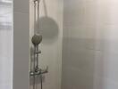 Modern shower in a tiled bathroom