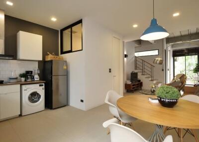 Open concept kitchen and living space with dining area