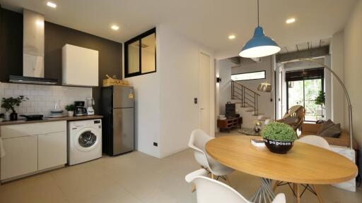 Open concept kitchen and living space with dining area