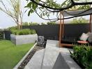 beautifully landscaped garden with seating area