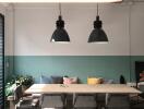 Modern dining area with pendant lighting and seating