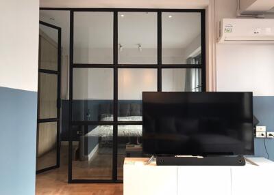 Modern living room with glass partition